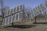 Dual solar trackers (2400 Watts) help meet the power needs of the Roe family and provide back-up power during outages. The system was designed and installed by Independent Power Systems