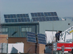 The system uses both roof-mounted and pole-mounted PV arrays.